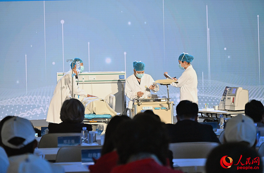 金華職業技術大學“家門口的守護:糖尿病並發症的社區精准防治”項目參賽隊奪冠。人民網記者 孫一凡攝