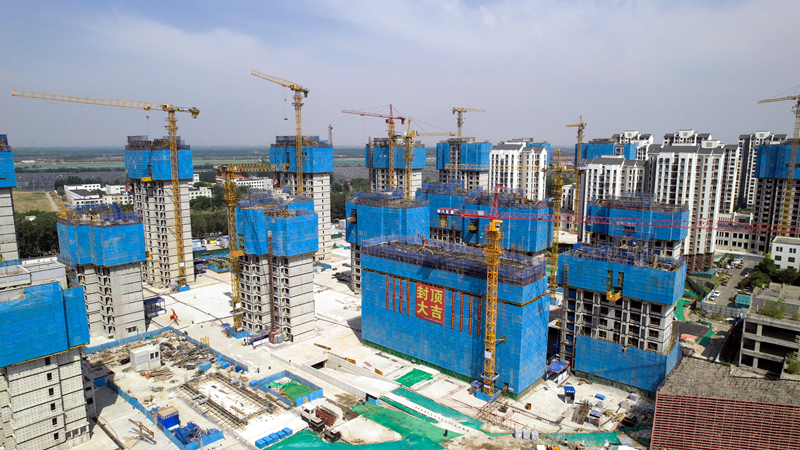 杨柳青镇城中村改造一期项目24栋住宅楼主体结构全部完成封顶。西青区委宣传部供图