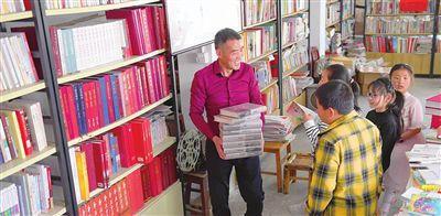 天津出版传媒集团助力农家人图书室建设